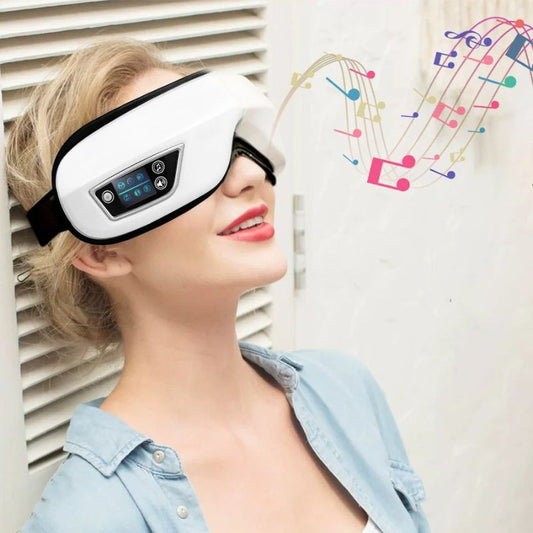 Femme tête en arrière portant le masseur oculaire avec notes de musique colorées symbolisant le Bluetooth